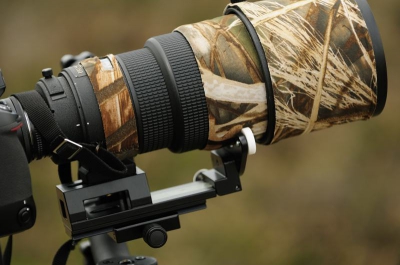 de lenssteun gemonteerd onder de lens. de lens is een 300mm maar is ook leverbaar voor alle gangbare telelenzen van de bekende merken
